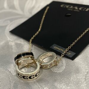 Coach Gold and Black Pendant Necklace New 16”Comes with Dust Bag.